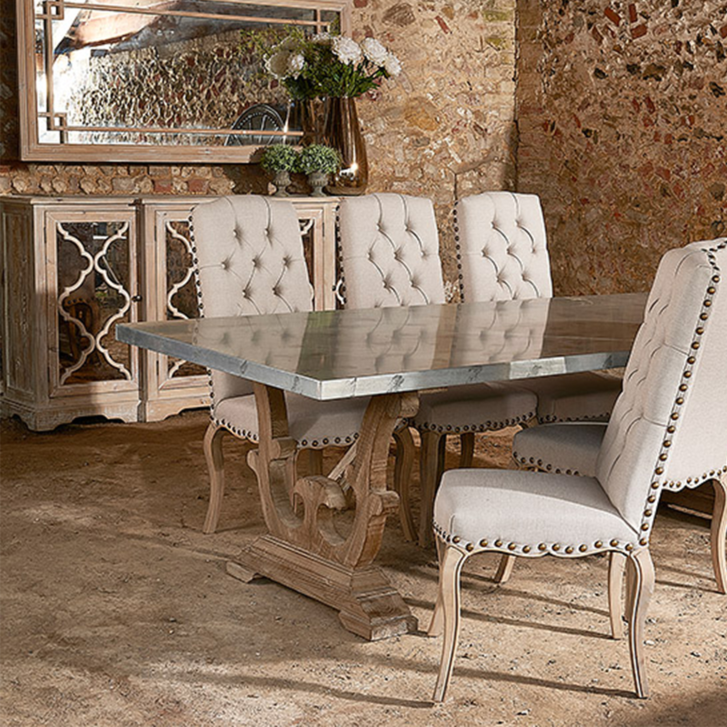 Zinc is a natural mineral that is antifungal and antibacterial. It is non-porous so all tarnish spots are on the surface level and can be removed by polishing or buffing. It is a reactive metal that will continue to age over time. Oils, acids and standing water will change the surface appearance. Over a period of time the spots and other patina marks will run together so that the top is a unique piece. Zinc will oxidise to a darker metallic colour. Areas of heavy use will be smoother and lighter in colour.
